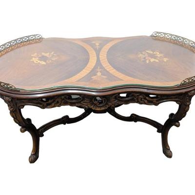 #104 • Oval Carved Inlaid French Style Coffee Table with Glass Top
WWW.LUX.BID
