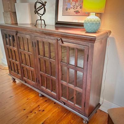 Tall credenza with glass doors