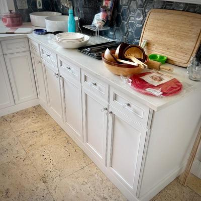 All cabinets countertops, island, sink, island, etc. in kitchen