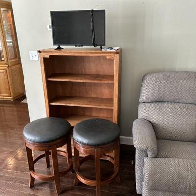 stools, recliner, bookshelf, TV