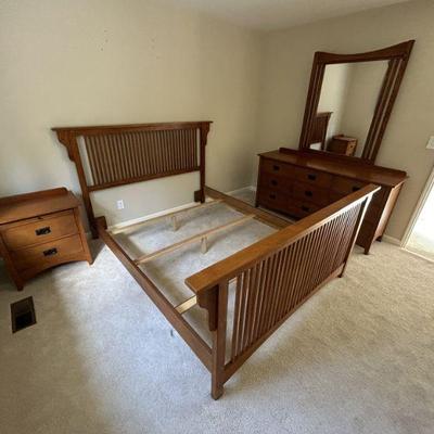 The set includes dresser with mirror and side table