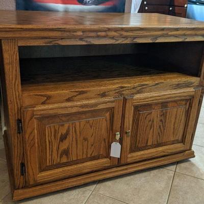 Oak TV Stand w/ swivel and rollers