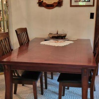 Dining Table with 4 chairs and a leaf