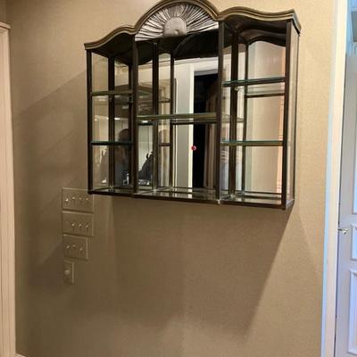 Wall hung cabinet/mirrored back