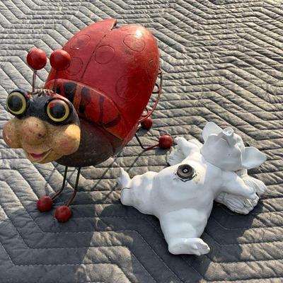 Lady bug decor and pig sprinkler