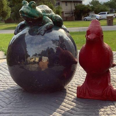 Frog gazing ball and concrete cardinal