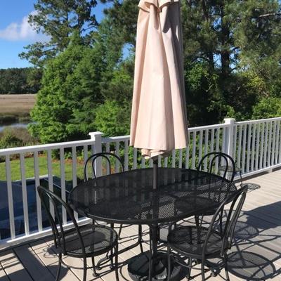 table, umbrella, and 4 chairs $579
table 55 X 42 X 29