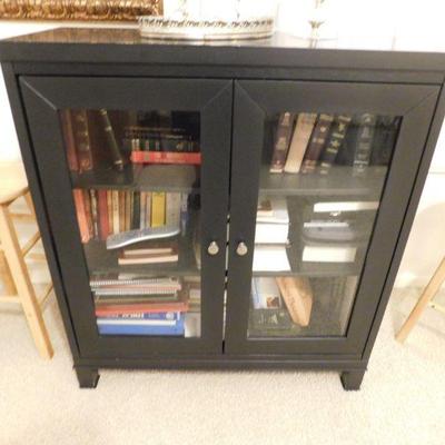 A cabinet full of religious books