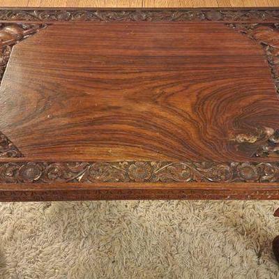 Exquisitely carved Anglo-Indian elephant coffee table, Handpicked single plank platform as indicated by burl and age striations, This...