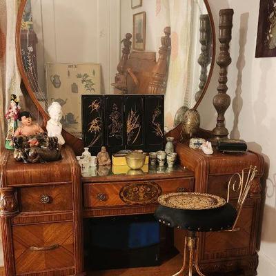 Look Over on the Left Side of the Vanity. That's a Jade Incense Holder with Three Goats Holding a Cloud in their Teeth.