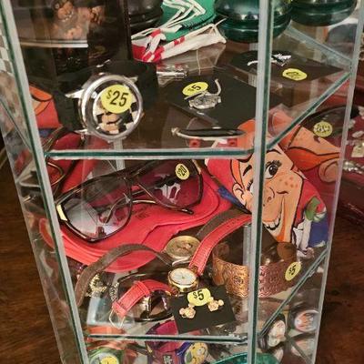 Watches, sunglasses, and rock and roll memorabilia 