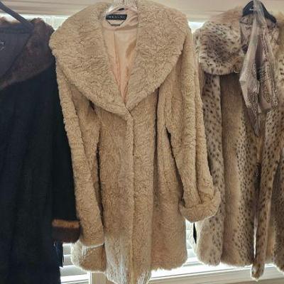 New with tags faux fur coats