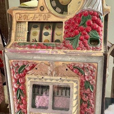 1940s Nickle Watling Cherry Rol A top Slot Machine restored and ready to play and pay.