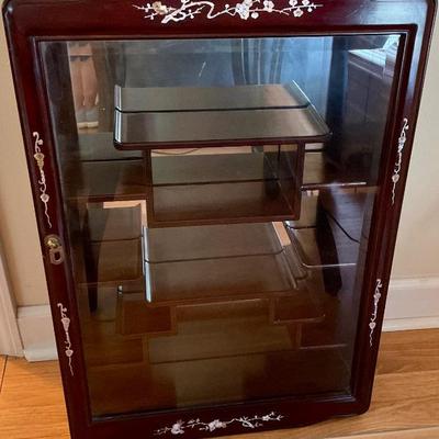 Asian wall curio cabinet