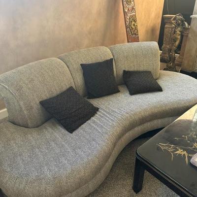 Elegant mid modern gray couch. 