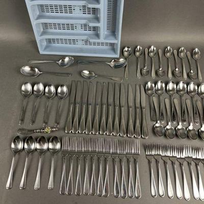 Lot 583 | Oneida Flatware Set with Organizer and More