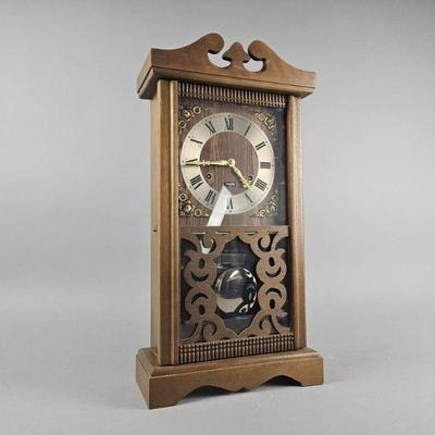 Lot 199 | Vintage 31 Day Wooden Mantle Clock W/ Key