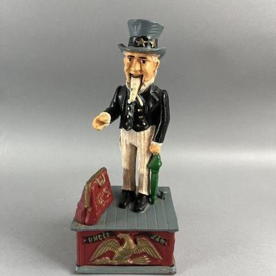 Lot 633 | Vintage Uncle Sam Cast Iron Coin Bank
