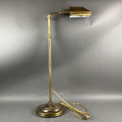 Lot 563 | Brass Adjustable Height Twist Head Floor Lamp