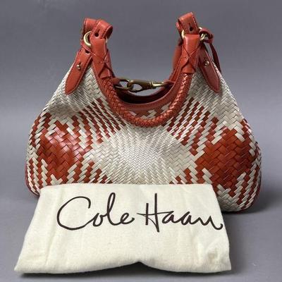 Lot 135 | Cole Haan Genevieve Woven Leather Handbag