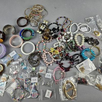 Lot 337 | Vintage Bangles, Charms & More Costume Jewelry