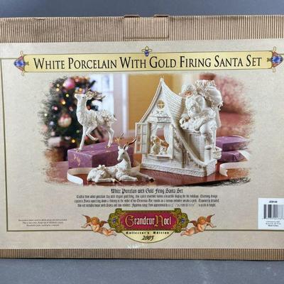 Lot 351 | Grandeur Noel 2003 White w Gold Firing Santa Set
