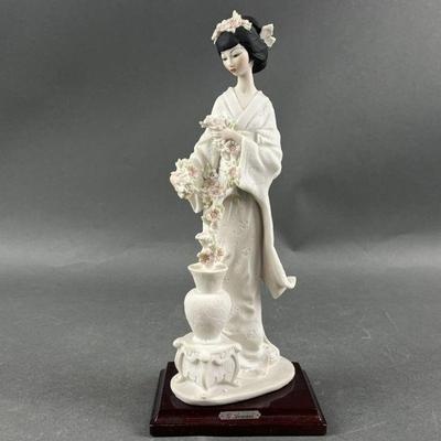 Lot 531 | G. Armani Figurine Lady with Flowers