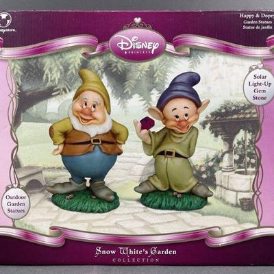Lot 447 | Happy and Dopey Garden Statues Snow White Set