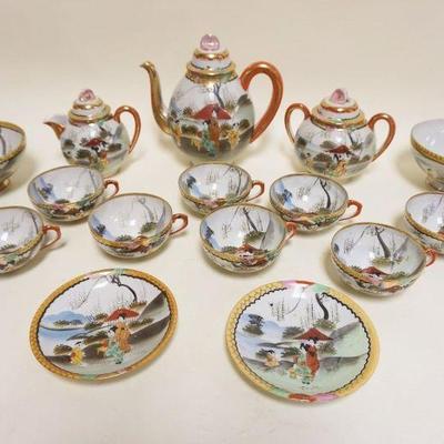 1021	GROUP OF ASIAN CHINA INCLUDING TEAPOT, CREAMER & SUGAR, 2 BOWLS, 8 CUPS & 2 UNDERPLATES
