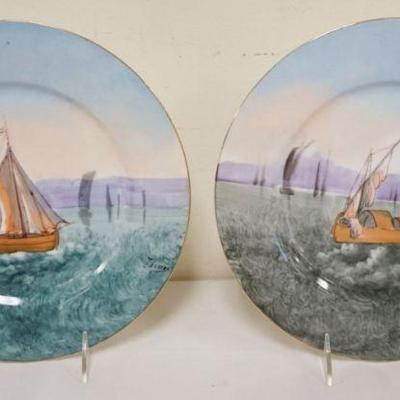 1014	LIMOGES FRANCE 2 ARTIST SIGNED HAND PAINTED PLATES W/IMAGES OF SAIL BOATS, EACH APPROXIMATELY 10 1/2 IN

