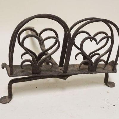 1254	PRIMITIVE WROUGHT IRON HEART SHAPED REVOLVING TOASTER, APPROXIMATELY 17 IN X 13 IN X 8 IN HIGH
