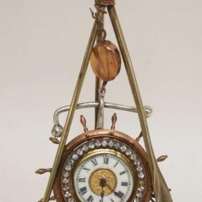 1115	ANTIQUE VICTORIAN NAUTICAL THEMED CLOCK, SOME JEWELS AND GLASS BEZELL MISSING
