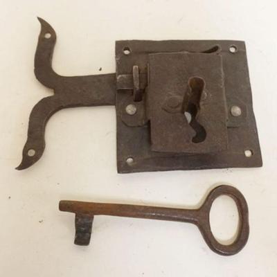 1216	LARGE ANTIQUE HAND FORGED METAL LOCK AND KEY, APPROXIMATELY 9 IN X 7 IN
