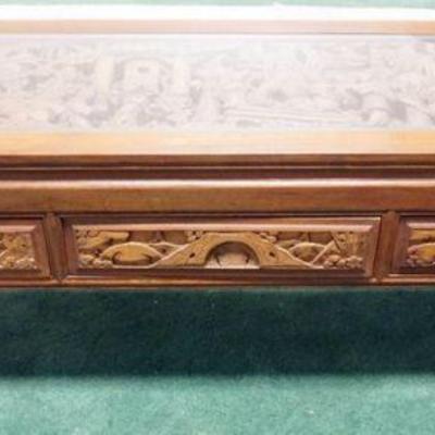 1076	OUTSTANDING ASIAN CARVED WOOD COFFEE TABLE HAVING 3 DRAWERS & 3 DIMENSIONAL CARVING UNDER GLASS TOP, APPROXIMATELY 60 IN X 20 IN X...