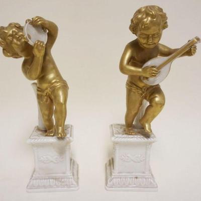 1109	PAIR OF ITALIAN PORCELAIN BUD VASES, CHERUBS PLAYING INSTRUMENTS, EACH APPROXIMATELY 8 IN H
