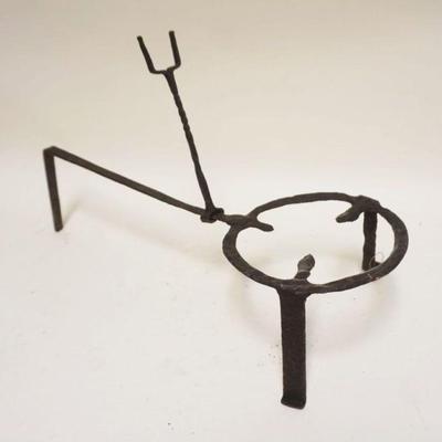 1249	PRIMITIVE WROUGHT IRON TRIVIT W/ATTACHED HOLDER, APPROXIMATELY 9 IN X 23 IN X 14 IN HIGH
