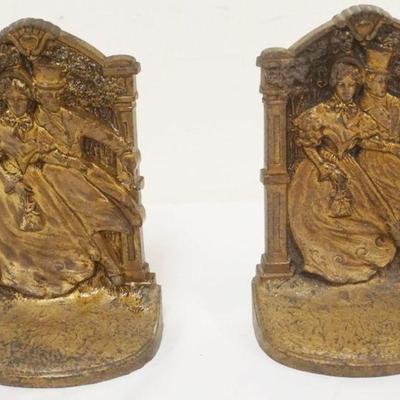 1121	BRONZE BOOKENDS, IMAGE OF VICTORIAN COURTING COUPLE, EACH APPROXIMATELY 4 IN X 6 1/2 IN H
