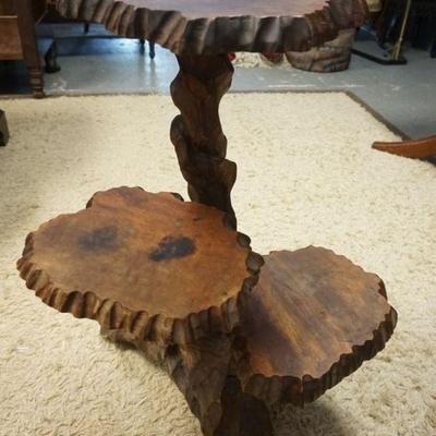 1080	CARVED WOOD 3 TIER SHELF IN THE FORM OF A TREE TRUNK, APPROXIMATELY 34 IN HIGH
