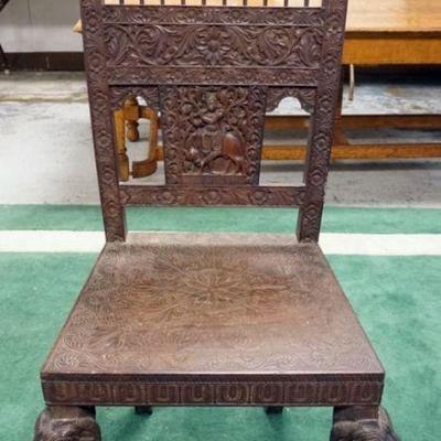 1075	HEAVY CARVED WOOD ASIAN CHAIR W/SERPENT LEGS, APPROXIMATELY 51 IN HIGH
