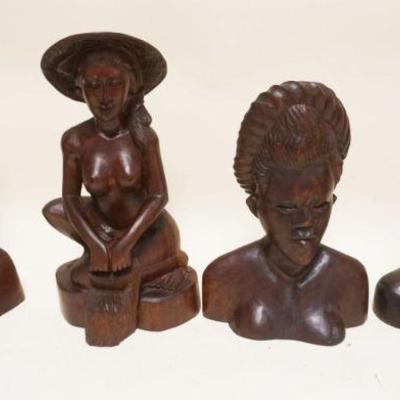 1057	4 CARVED WOOD ETHNIC FIGURES, TALLEST APPROXIMATELY 15 IN HIGH

