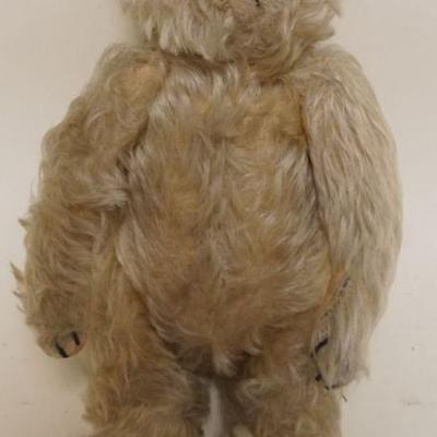 1186	ANTIQUE MOHAIR JOINTED TEDDY BEAR WITH GLASS EYES AND SWIVEL NECK, APPROXIMATELY 13 IN H
