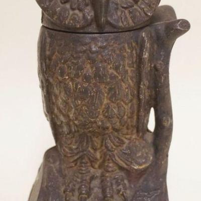 1201	ANTIQUE CAST IRON MECHANICAL OWL BANK WITH GLASS EYES, APPROXIMATELY 8 IN H, MISSING COIN PLUG ON BASE
