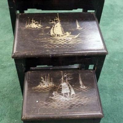 1082	NEST OF 3 LACQUERED ASIAN TABLES W/METAL INLAY OF SAILING SHIPS, FINISH WORN ON TOP, APPROXIMATELY 17 IN X 13 IN X 23 IN
