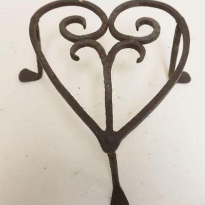 1220	PRIMITIVE WROUGHT IRON HEART SHAPED TRIVIT, APPROXIMATELY 9 IN X 10 IN X 5 1/2 IN H
