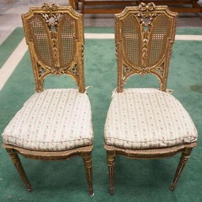 1094	PAIR OF ANTIQUE ITALIAN GILT FINISHED SIDE CHAIRS W/CANE BACK & SEATS, WEAR TO FINISH
