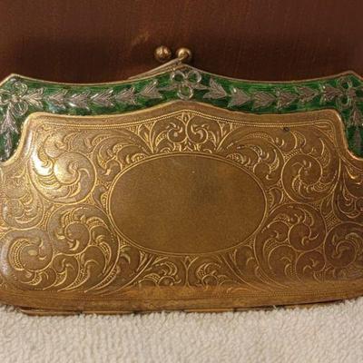 Gold filled purse with porcelain face clock inside $175