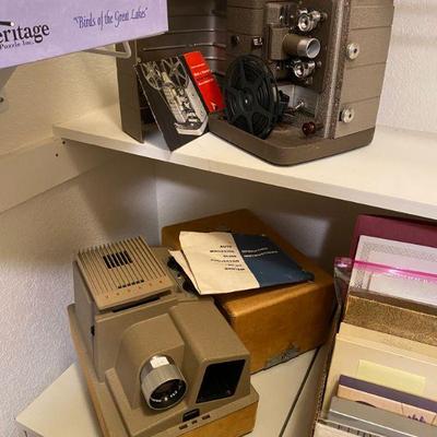 Vintage Bell & Howell 8mm projector and 35mm, 553555 slide projector by Revere