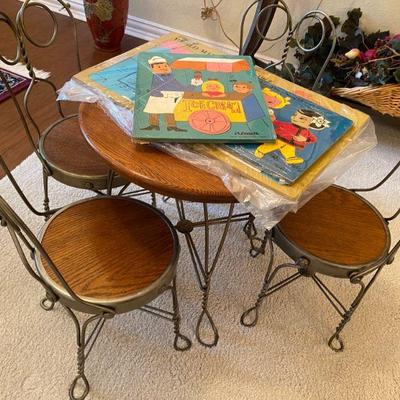 Childs antique ice cream parlor set and assortment of vintage wooden puzzles