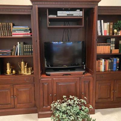Wall unit with Insignia TV and Samsung DVD Player