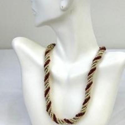 Vintage 14k, Ruby and Pearl Intertwined Gorgeous Necklace 

Such a beautiful design, measures 15.5 inches long 

Weight: 84.5 grams. 